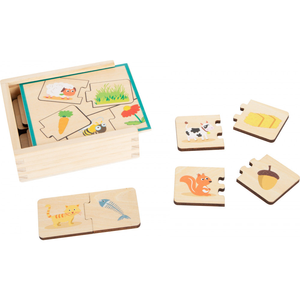 Educational game wooden puzzle feeding animals