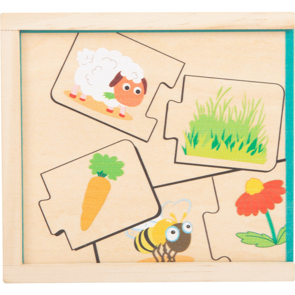 Educational game wooden puzzle feeding animals