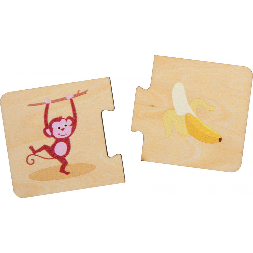 Educational game wooden puzzle feeding animals